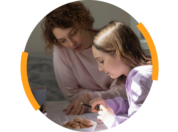 Mother going over homework with daughter