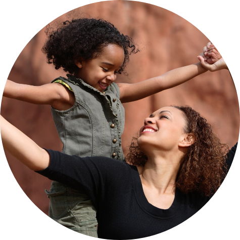 Woman and daughter smiling